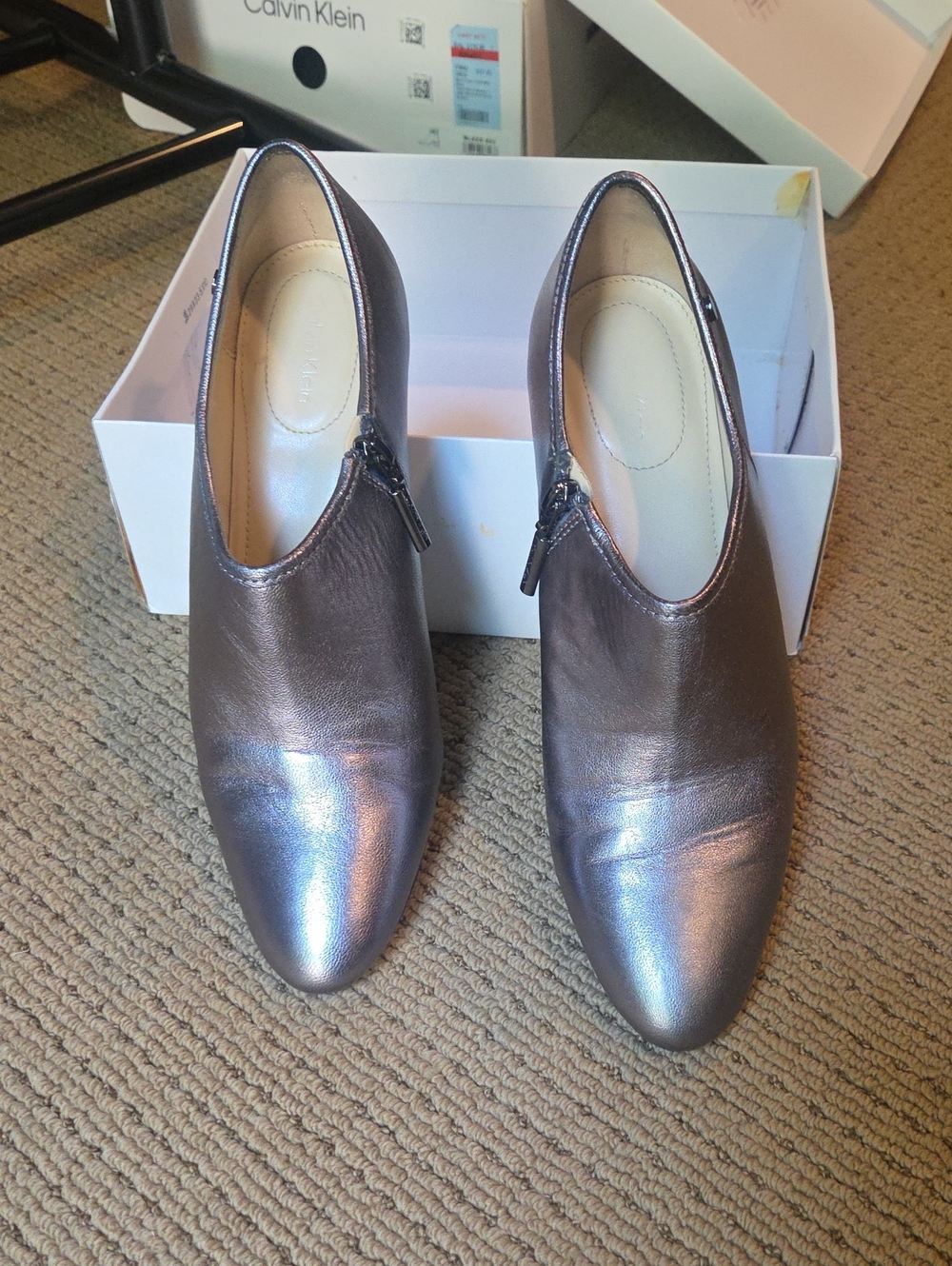 Calvin Klein Iridescent Pewter Zip Ankle Booties